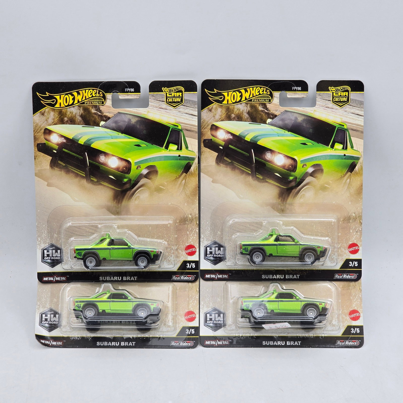 Lot of 4 Hot Wheels HW Off Road Premiums: Includes (4) Subaru BRAT premium models from the Car Culture HW Off Road series. Cars-Appear to be in good condition with clean paint, sharp tampo detail, and no obvious wear visible. Cards-Show light