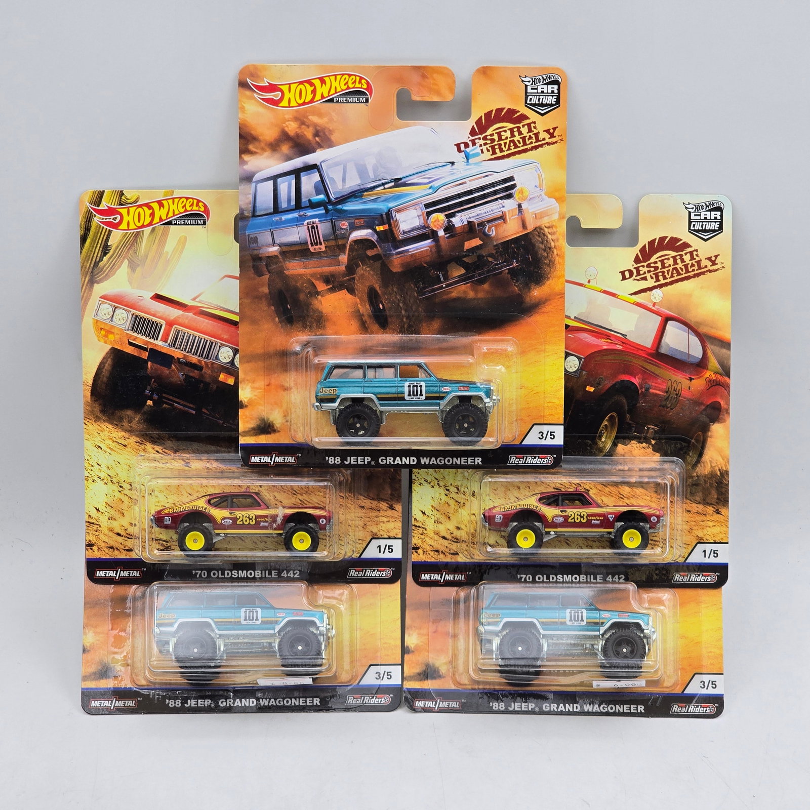 Lot of 5 Hot Wheels Desert Rally Premiums: Includes a pair of â€™70 Oldsmobile 442 models and (3) â€™88 Jeep Grand Wagoneer premium models from the Car Culture Desert Rally series. Cars-Appear to be in good condition with clean