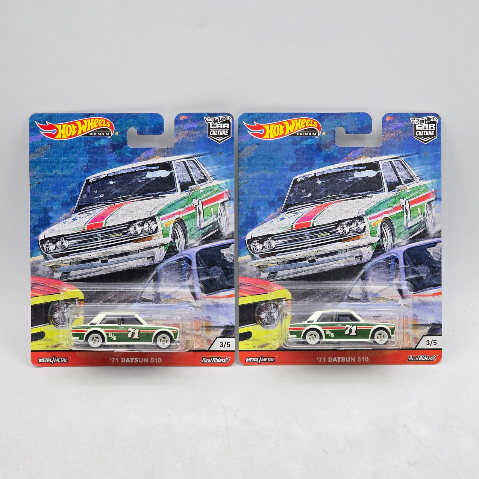 Pair of Hot Wheels Premiums: Includes (2) â€™71 Datsun 510 premium models from the Car Culture series. Cars-Appear to be in good condition with clean paint, sharp tampo detail, and no obvious wear visible. Cards-Show ligh
