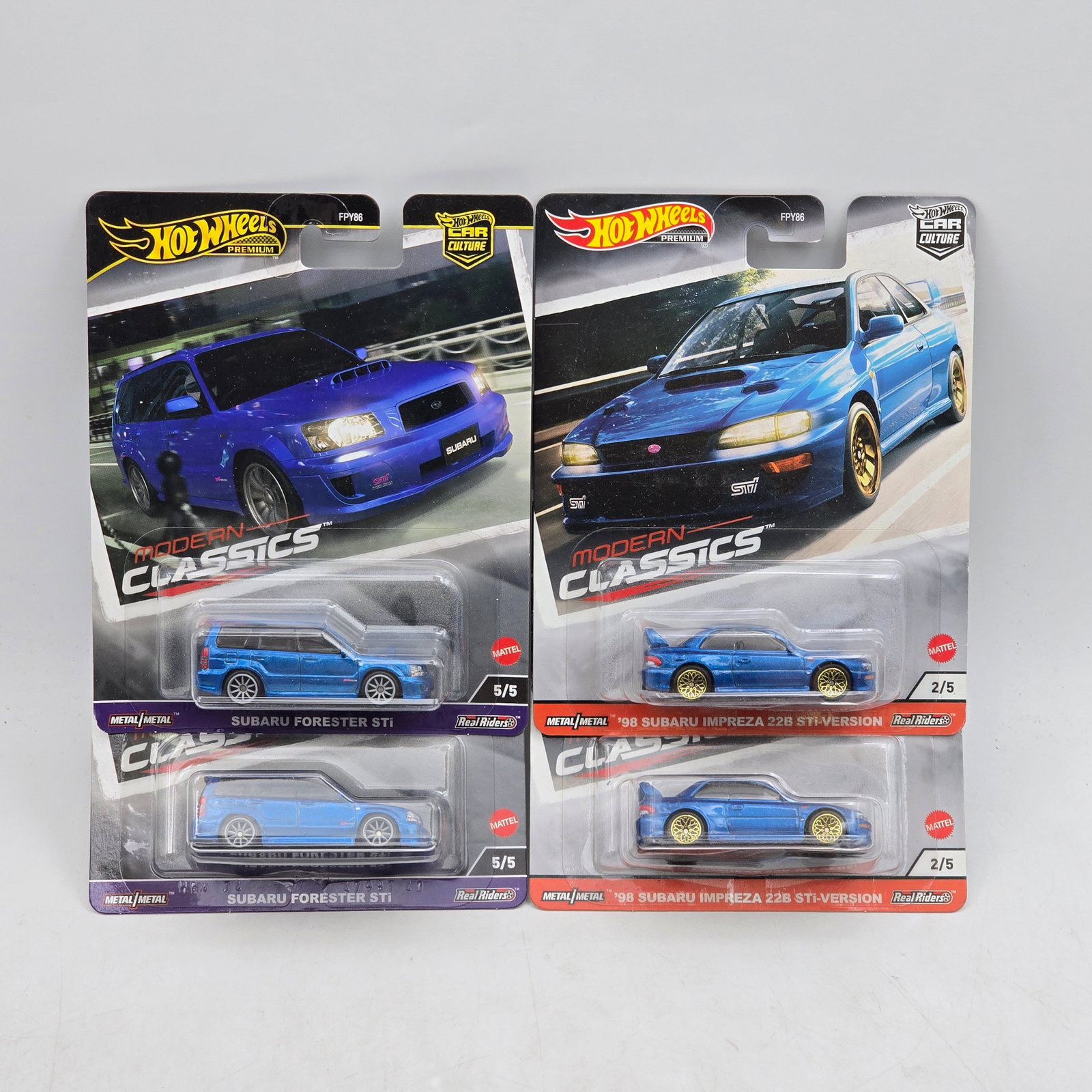 Lot of 4 Hot Wheels Modern Classics Premiums: Includes a pair of Subaru Forester STI models and a pair of â€™98 Subaru Impreza 22B-STi Version premium models from the Car Culture Modern Classics series. Cars-Look to be in good condition w