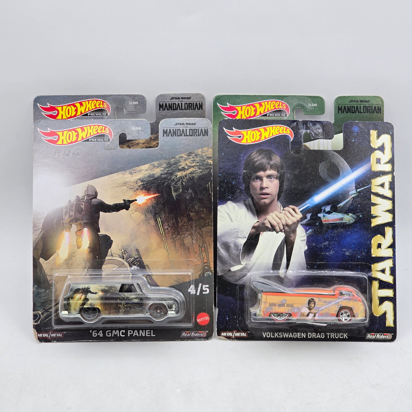 Lot of 4 Hot Wheels Star Wars & Mandalorian Premiums: Includes a pair of â€™64 GMC Panel models, â€™66 Dodge A100, and Volkswagen Drag Truck premium models from the Star Wars and Mandalorian themed series. Cars-Appear to be in good condit