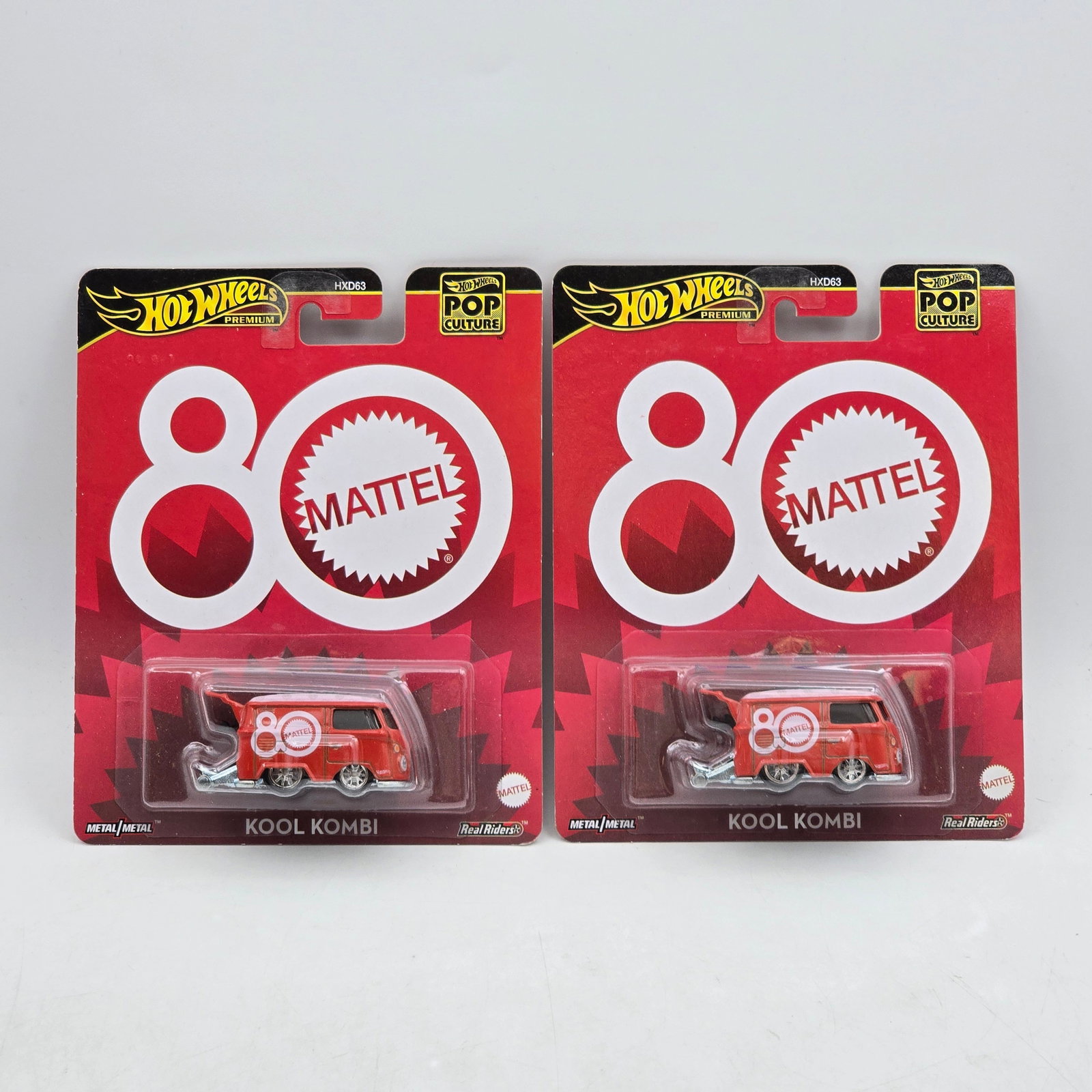 Pair of Hot Wheels Pop Culture Premiums: Includes (2) Kool Kombi premium models from the Mattel 80th Anniversary Pop Culture series. Cars-Appear to be in good condition with clean paint, sharp tampo detail, and no obvious wear visible. Cards