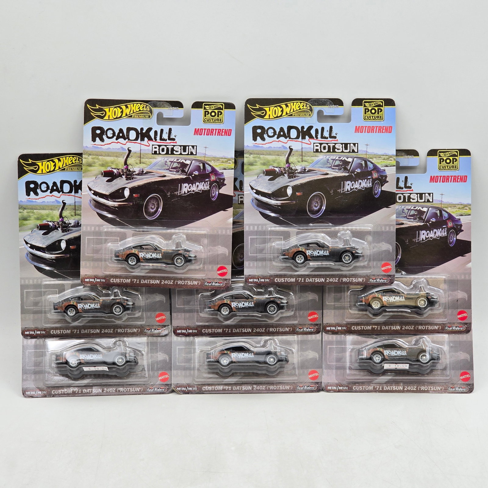 Lot of 8 Hot Wheels Pop Culture Premiums: Includes (8) Custom â€™71 Datsun 240Z â€?Rotsunâ€? premium models from the Roadkill x MotorTrend Pop Culture series. Cars-Look to be in good condition with no notable wear visible.