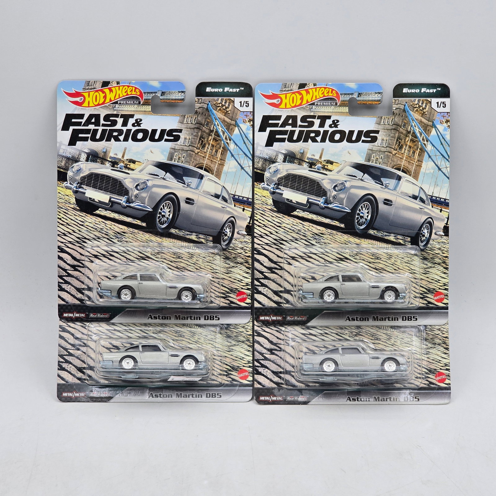 Lot of 4 Hot Wheels Fast & Furious Premiums: Includes (4) Aston Martin DB5 premium models from the Fast & Furious Euro Fast series. Cars-Look to be in good condition with no notable wear visible. Paint, tampos, glass, base and Real Riders wh