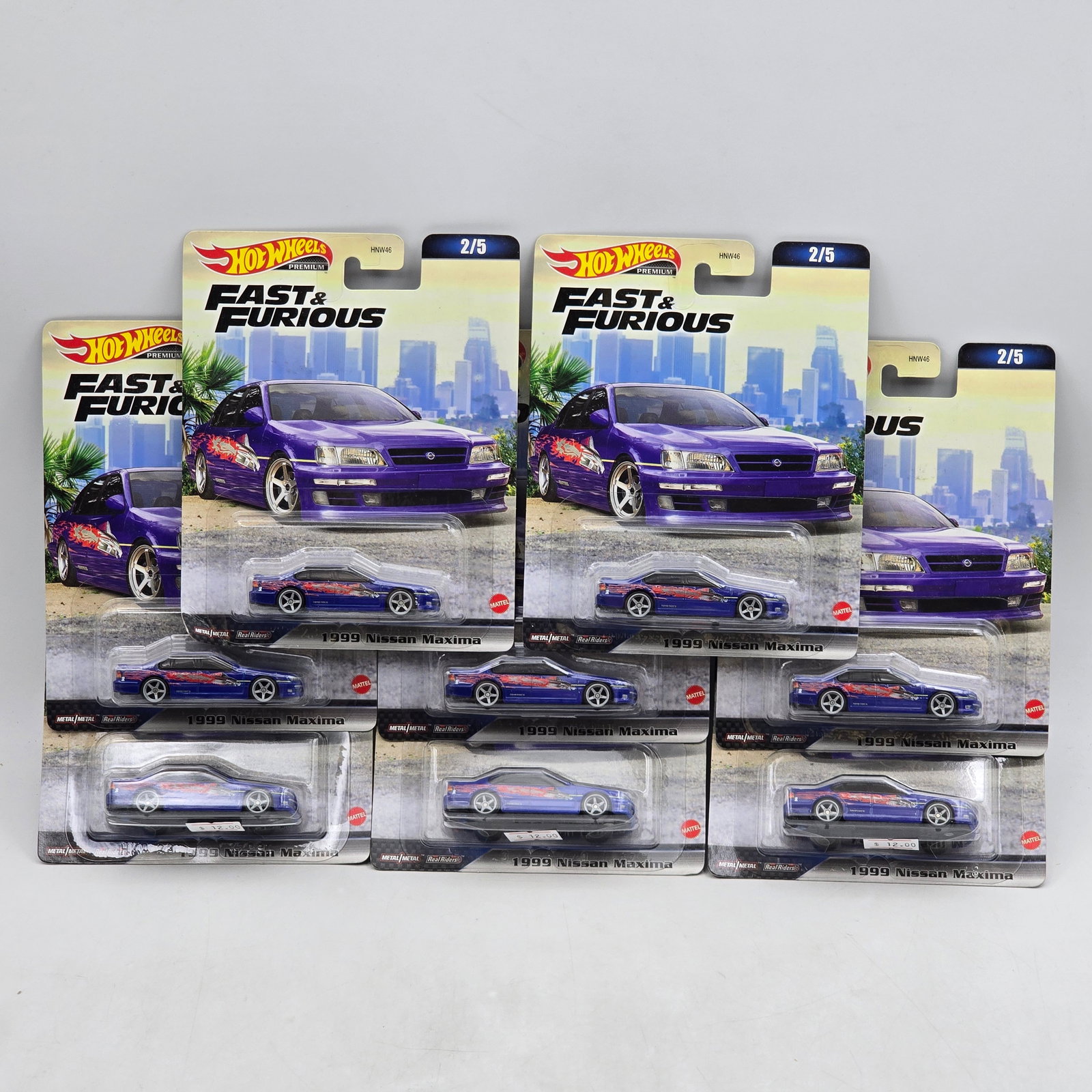 Lot of 10 Hot Wheels Fast & Furious Premiums: Includes (10) 1999 Nissan Maxima premium models from the Fast & Furious series featuring the purple street racing livery. Cars-Look to be in good condition with no notable wear visible. Paint, tam