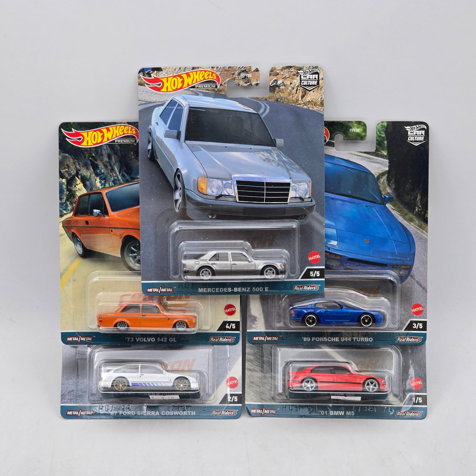 Hot Wheels Canyon Warriors Full Set Premiums: Complete 5-car Canyon Warriors premium set including BMW M5, Ford Sierra Cosworth, Porsche 944 Turbo, â€™73 Volvo 142 GL, and Mercedes-Benz 500 E models. Cars-Look to be in good condition with
