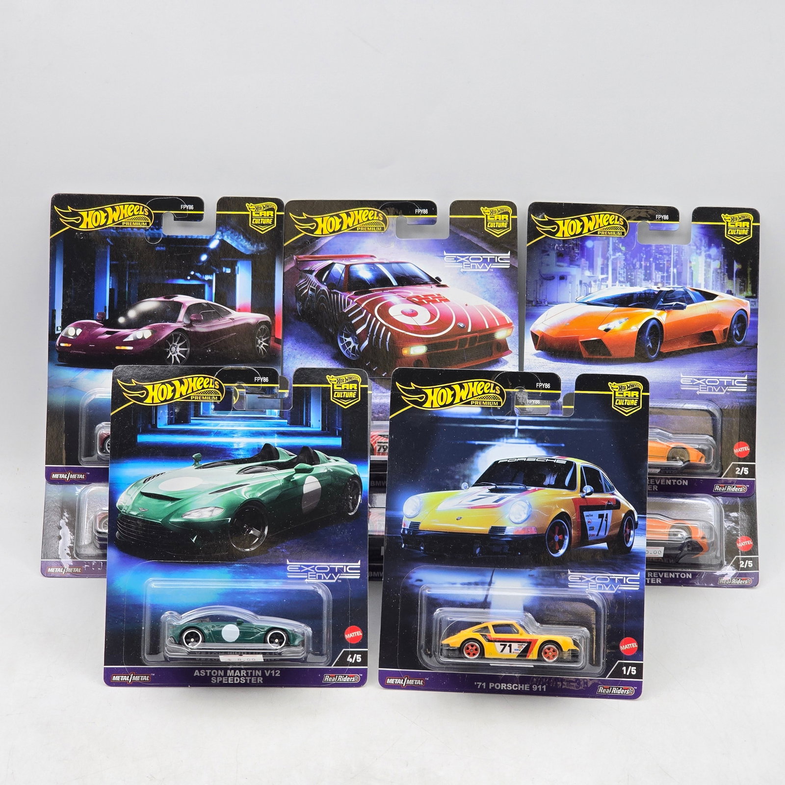 Lot of 8 Hot Wheels Exotic Envy Premiums: Includes a complete 5-car Exotic Envy premium set plus additional duplicate models. Featured castings include â€™71 Porsche 911, Lamborghini Reventón Roadster, Aston Martin V12 Speedste