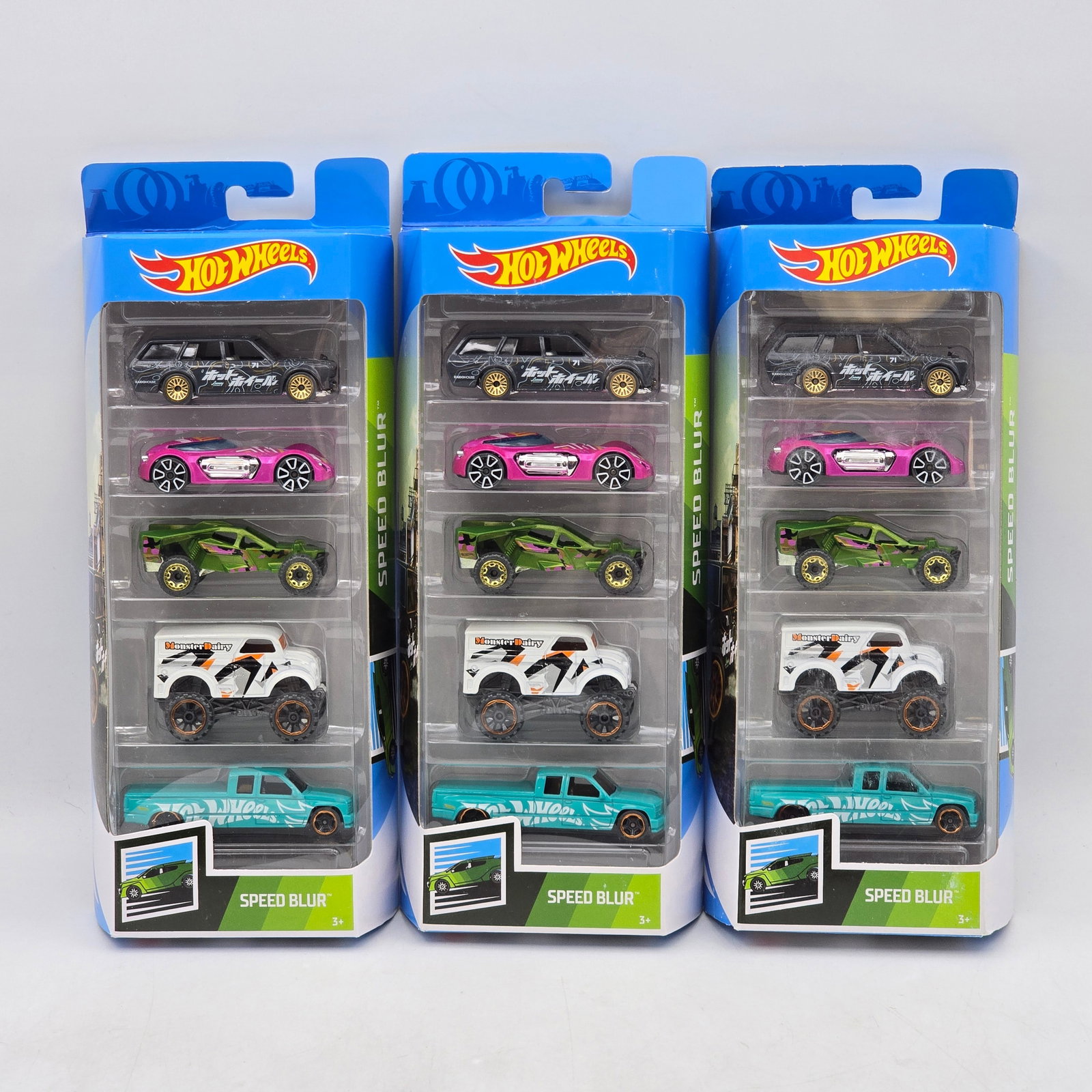 Lot of 3 Hot Wheels Speed Blur 5-Packs: Includes (3) Hot Wheels Speed Blur 5-pack sets featuring a mix of fantasy racers, off-road trucks, and stylized performance castings. Vehicles-Look to be in good condition with bright paint, colorful 