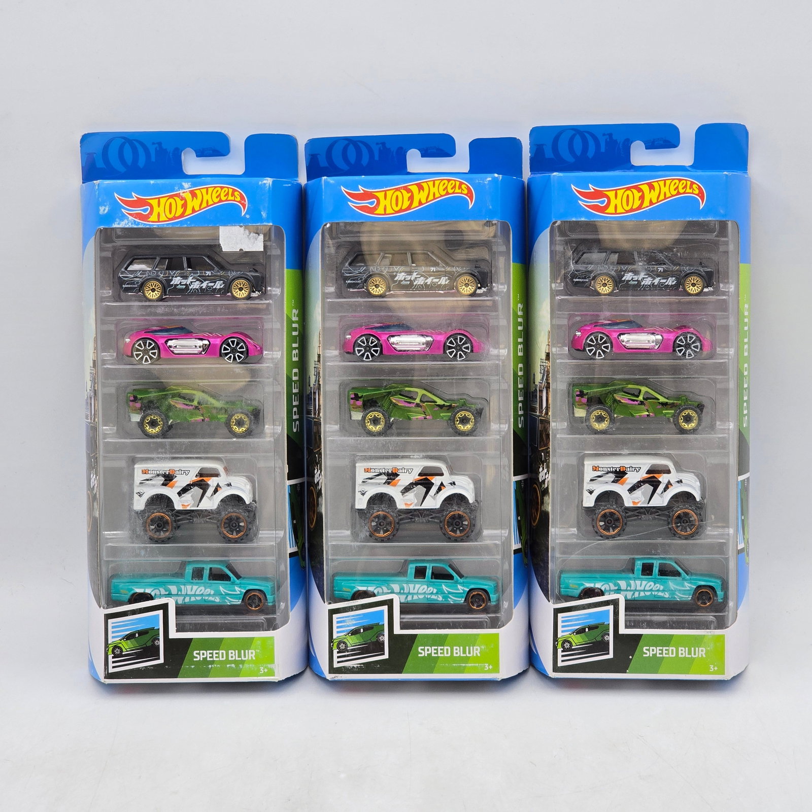 Lot of 3 Hot Wheels Speed Blur 5-Packs: Includes (3) Hot Wheels Speed Blur 5-pack sets featuring a mix of fantasy racers, off-road trucks, and stylized performance castings. Vehicles-Look to be in good condition with bright paint, colorful 