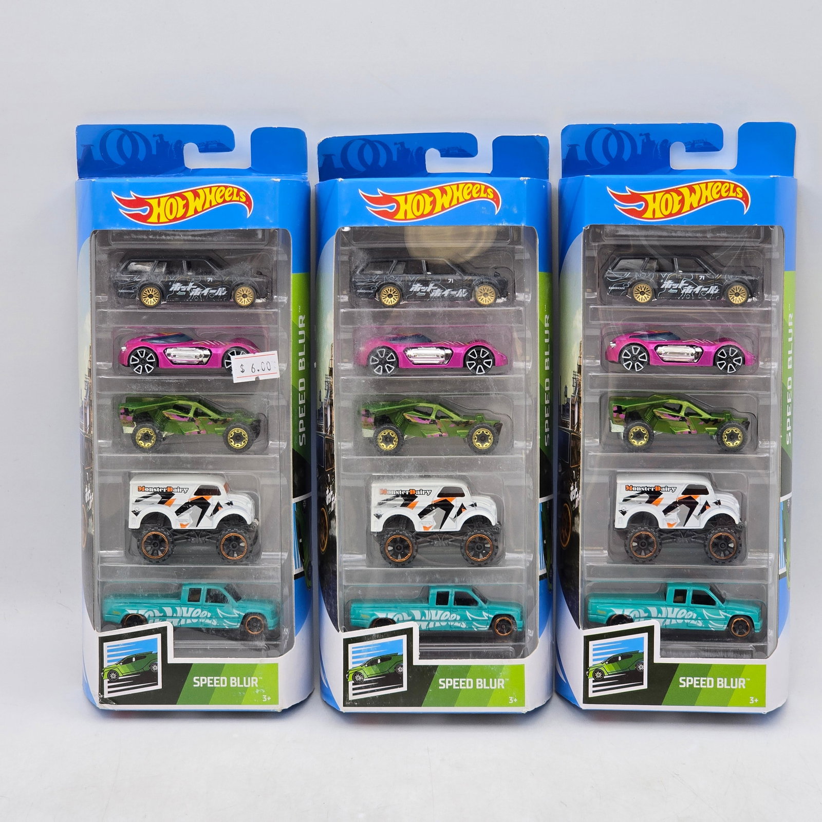 Lot of 3 Hot Wheels Speed Blur 5-Packs: Includes (3) Hot Wheels Speed Blur 5-pack sets featuring a mix of fantasy racers, off-road trucks, and stylized performance castings. Vehicles-Look to be in good condition with bright paint, colorful 