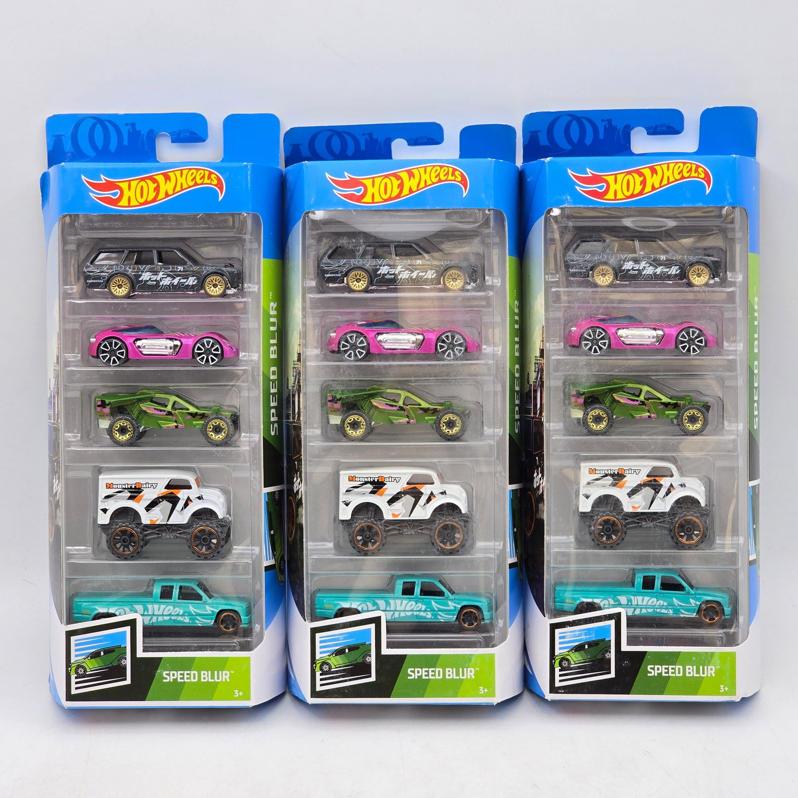 Lot of 3 Hot Wheels Speed Blur 5-Packs: Includes (3) Hot Wheels Speed Blur 5-pack sets featuring a mix of fantasy racers, off-road trucks, and stylized performance castings. Vehicles-Look to be in good condition with bright paint, colorful 