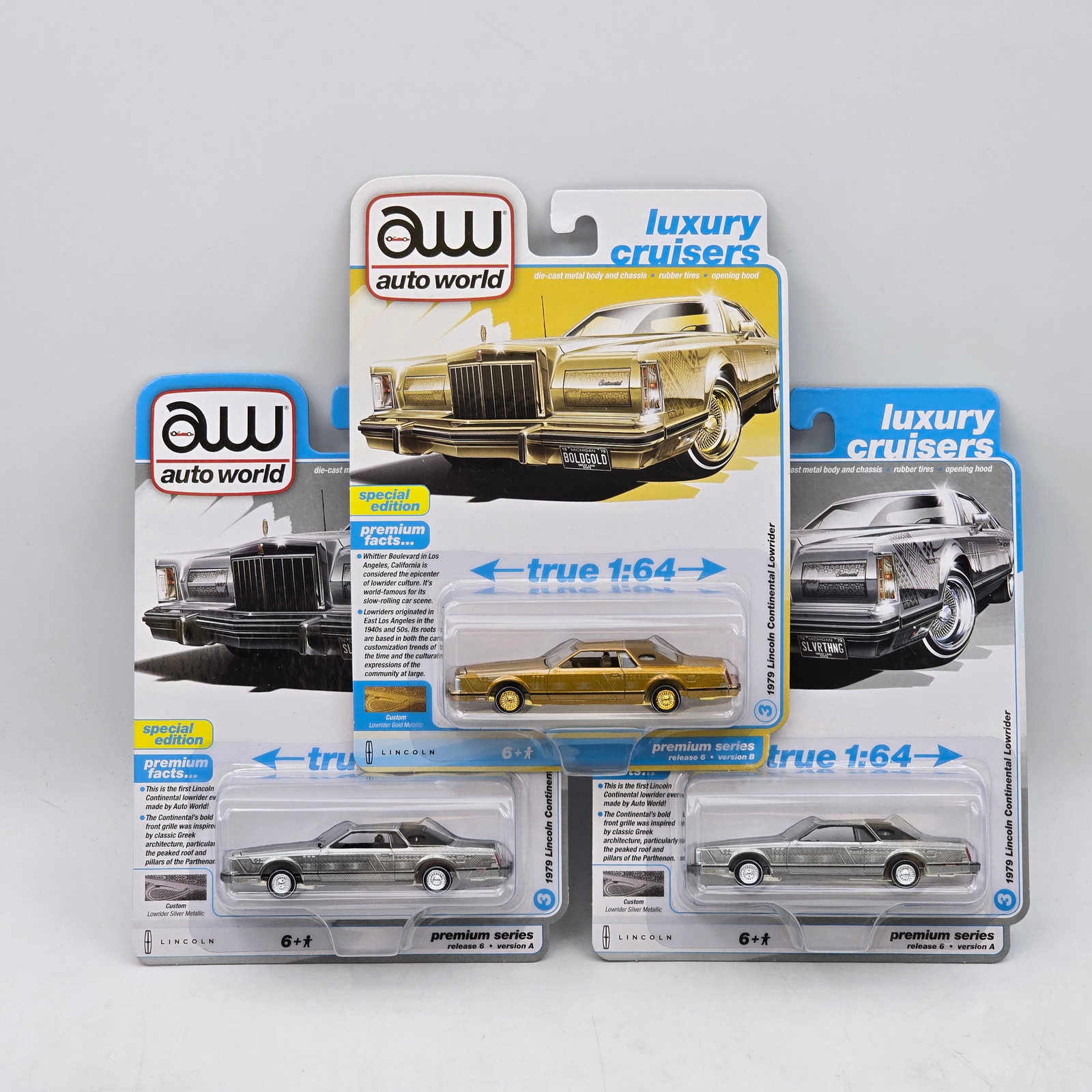 Lot of 3 Auto World Luxury Cruisers Diecast Models: Includes three Auto World Luxury Cruisers premium diecast models featuring 1979 Lincoln Continental Mark V castings in assorted colors and special edition variations. Vehicles-Look to be in good condi