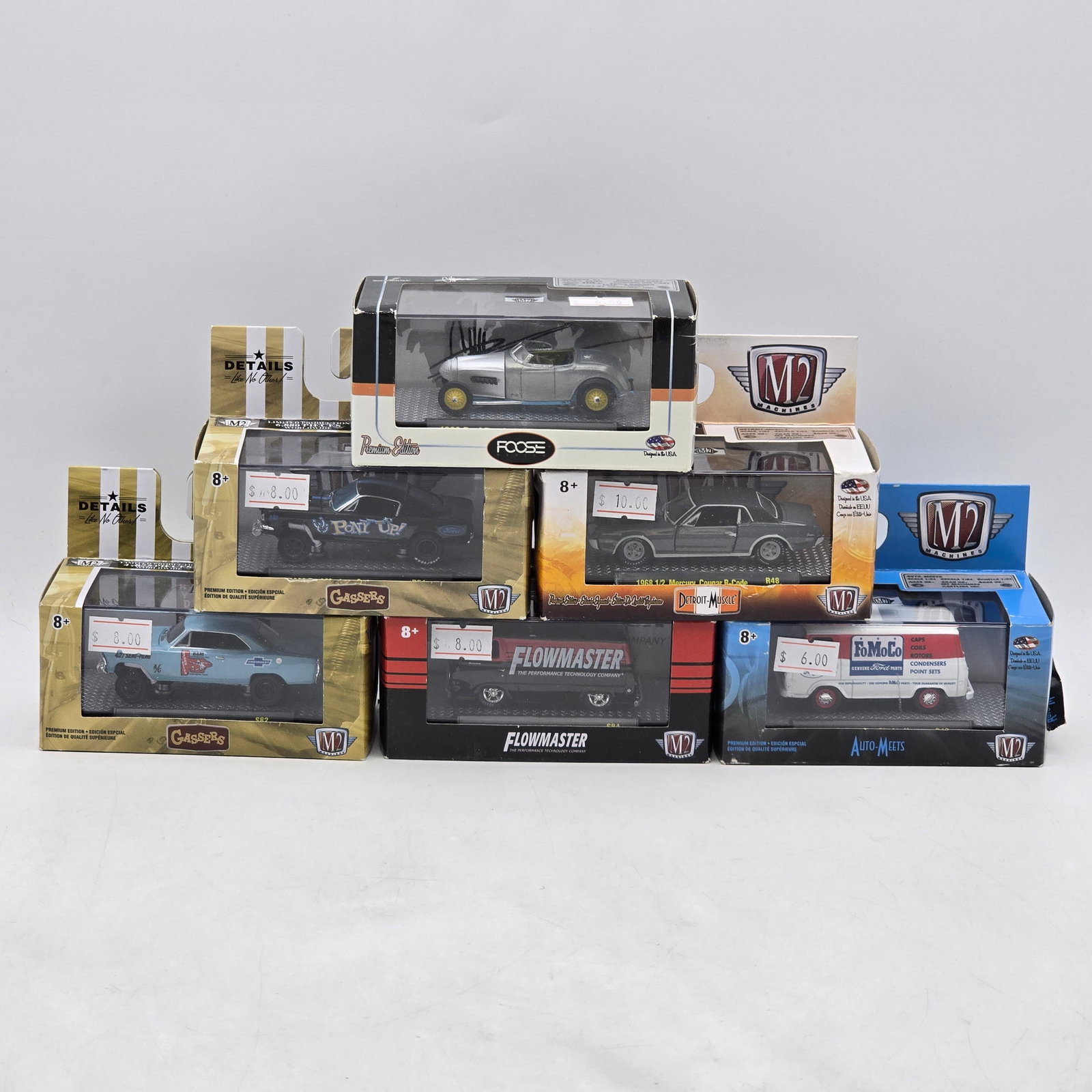 Lot of 6 M2 Machines Diecast Models: Includes a mixed group of M2 Machines releases from assorted series including Auto-Meets, Drivers, Foose, Flowmaster, and Gassers collections. Vehicles-Look to be in good condition with detailed paint
