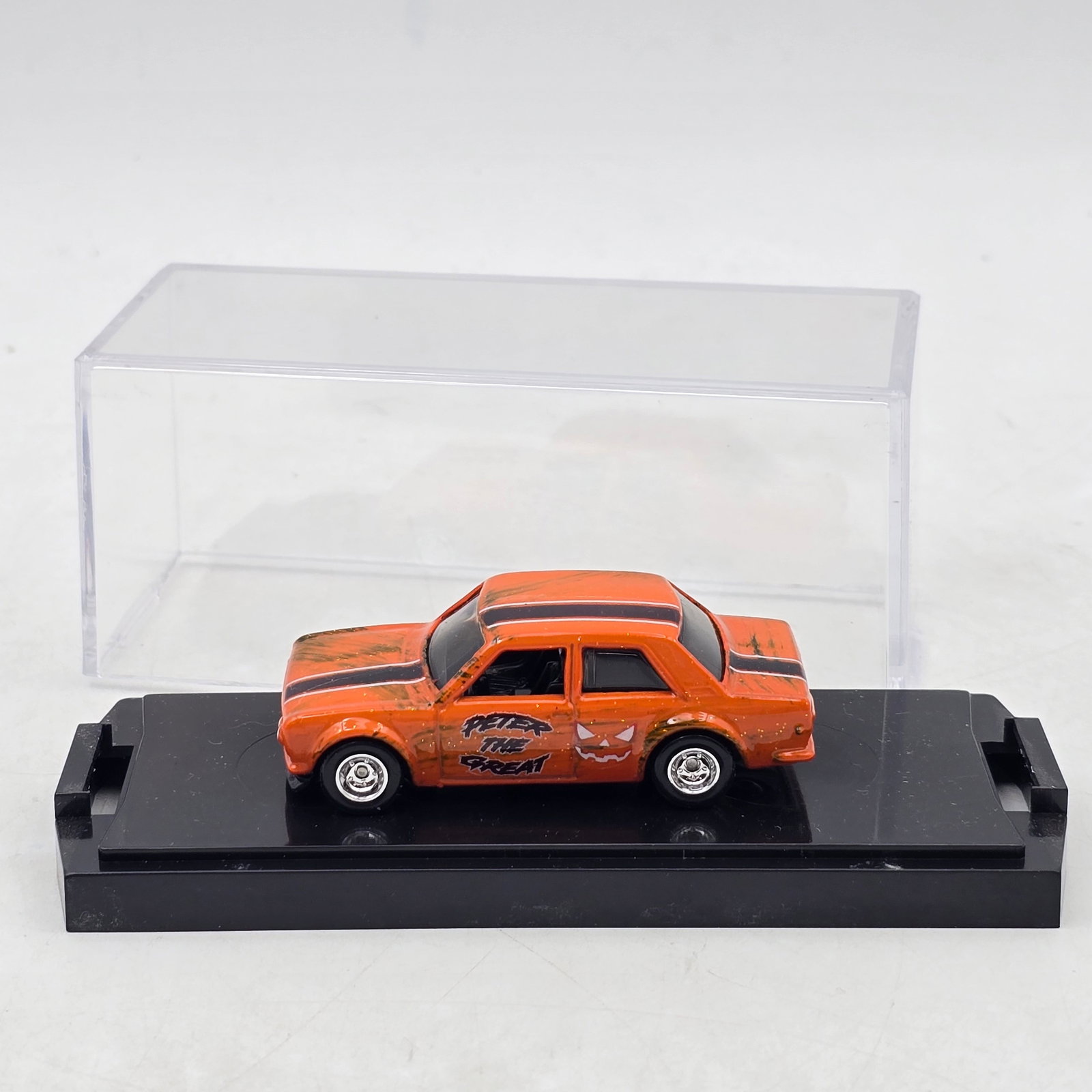 Chris Stangler Customs 2020 510 Sedan Custom: Hand-built custom diecast 2020 510 Sedan by Chris Stangler Customs featuring weathered orange paint, black striping, and â€?Peter the Greatâ€? graphics. Base is marked 1 of 3 October relea
