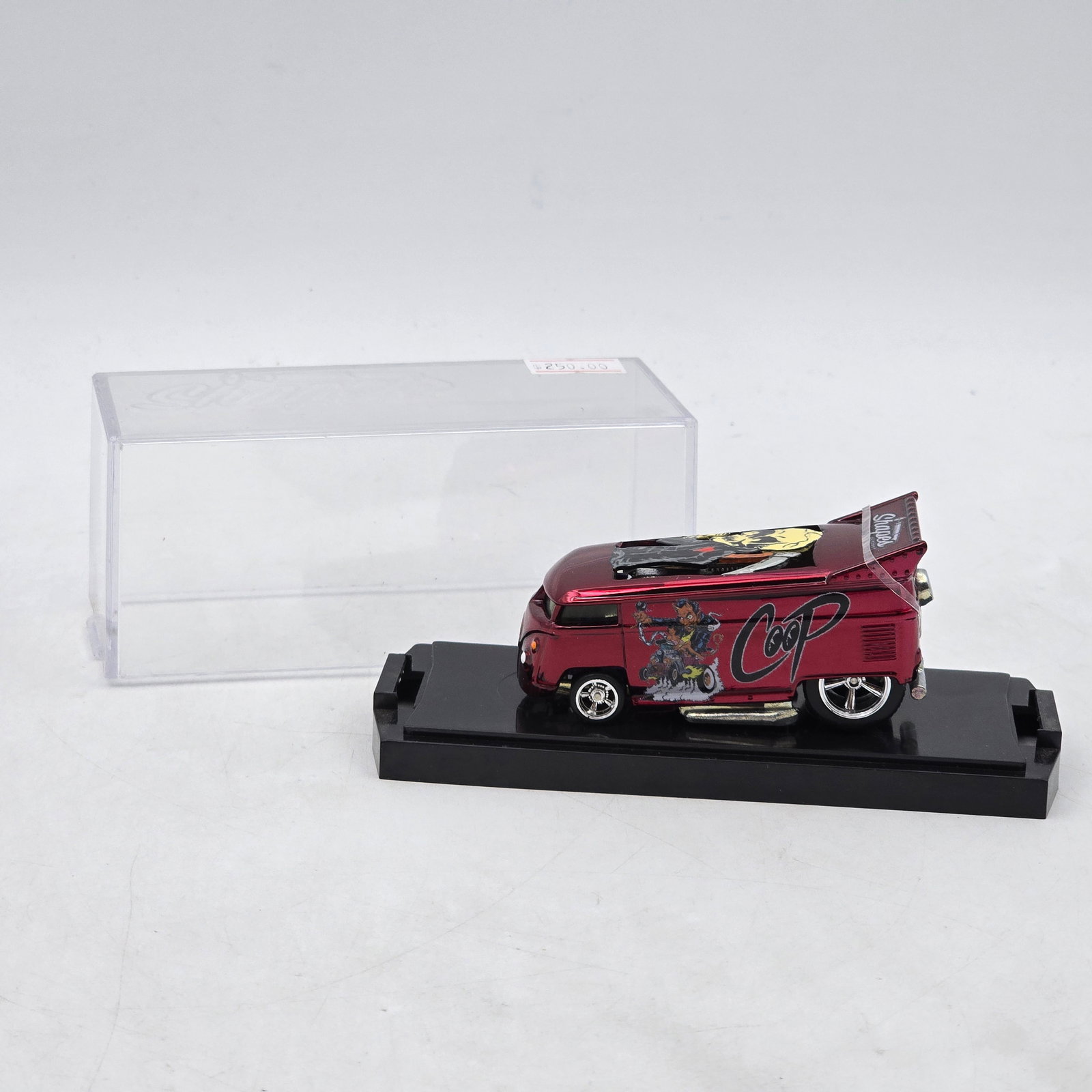 Chris Stangler Customs VW Drag Bus: Hand-built custom Volkswagen-style Drag Bus by Chris Stangler Customs featuring metallic red paint, illustrated side graphics, exposed engine detail, and custom wheels. Base is marked â€?1 of