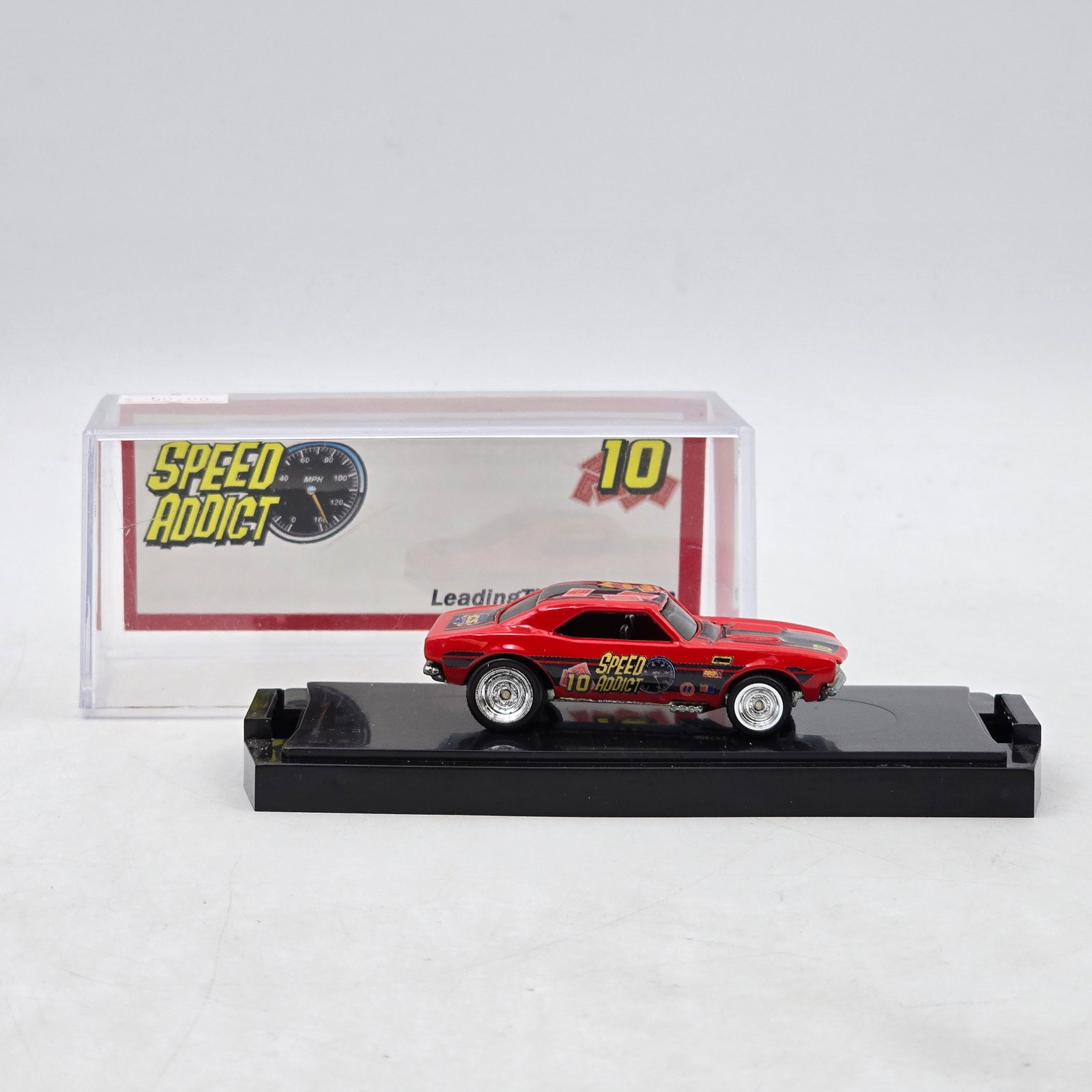 Chris Stangler Customs Speed Addict Muscle Car: Hand-built custom muscle car diecast by Chris Stangler Customs featuring bright red paint, Speed Addict graphics, drag-style stance, and chrome wheel detail. Base includes CS Customs branding and