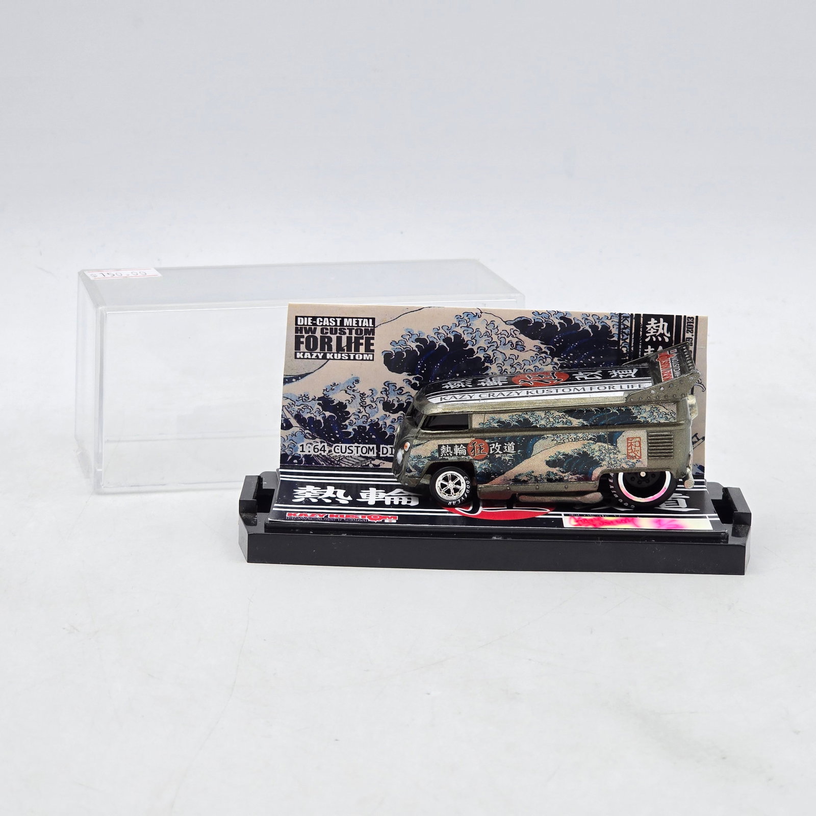 Kazy Kustom Japanese Wave VW Drag Bus: Custom Volkswagen-style Drag Bus by Kazy Kustom featuring reflective chrome-style finish, traditional Japanese wave artwork, red accent detailing, and raised drag-style rear wing. Hand-marked 1/3 on t