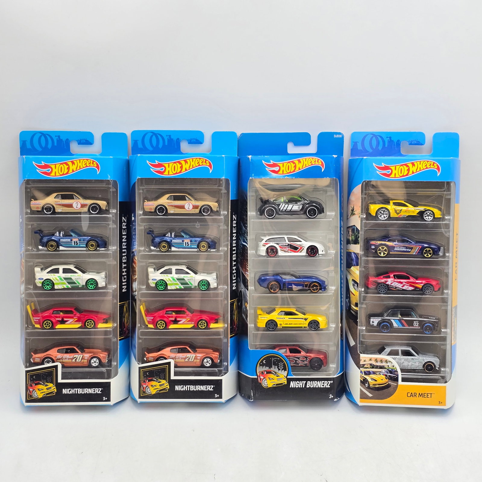 Lot of 4 Hot Wheels Nightburnerz & Car Meet 5-Packs: Lot of 4 Hot Wheels 5-packs including 3 Nightburnerz sets and one Car Meet set. Two matching Nightburnerz packs plus one additional assortment. Cars- All 20 cars remain factory sealed with paint, tamp