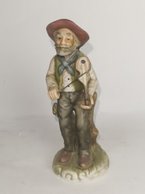 Porcelain Cowboy Figurine