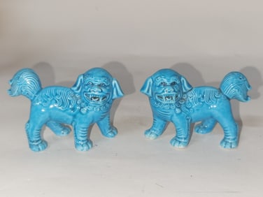Pr. of Chinese Porcelain Peacock Blue Glaze Lions