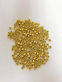 Group of Gold Tone Beads