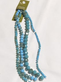Group of Faceted Blue Beads