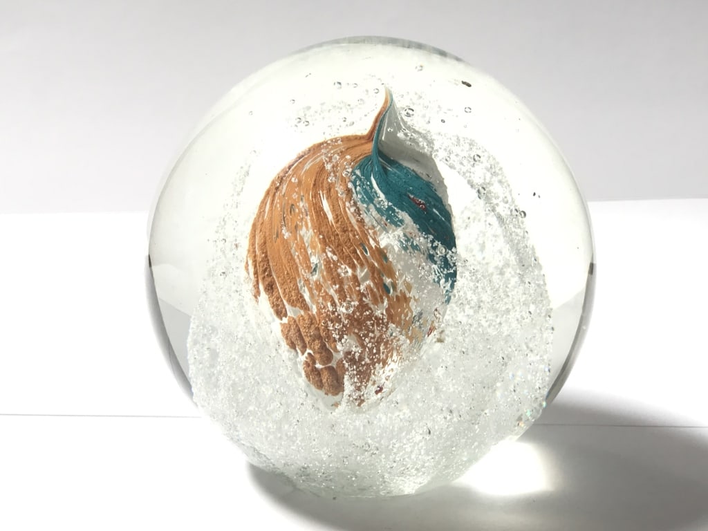 Unmarked Blue/Orange/White Swirl Glass Paperweight: Unmarked Blue/Orange/White Swirl Glass Paperweight, 3.75in by 3 7/8, Cracked