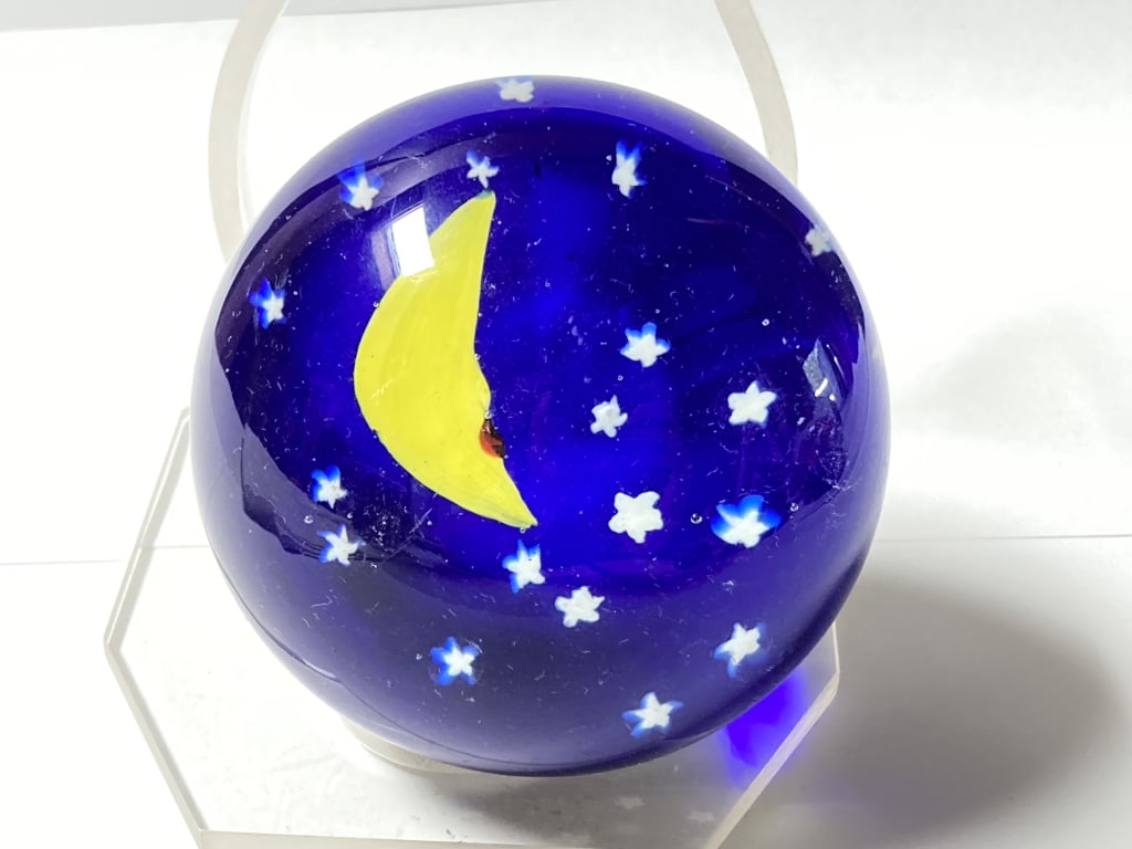 Unmarked Moon and Stars Glass Paperweight: Unmarked Moon and Stars Glass Paperweight, 2 5/8in by 3.75in