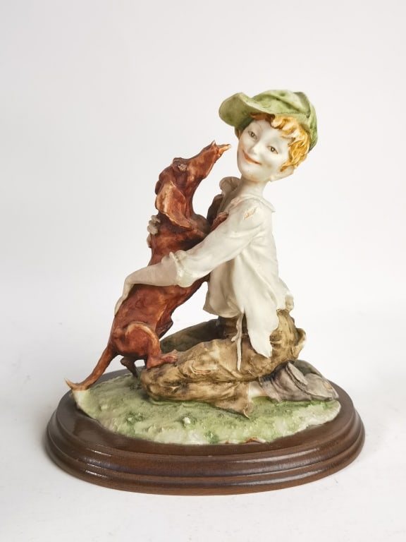 Armani Style Boy with Dog Figurine: Armani Style Boy with Dog Figurine, 8 1/8in