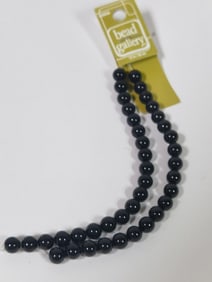 Group of Black Glass Beads