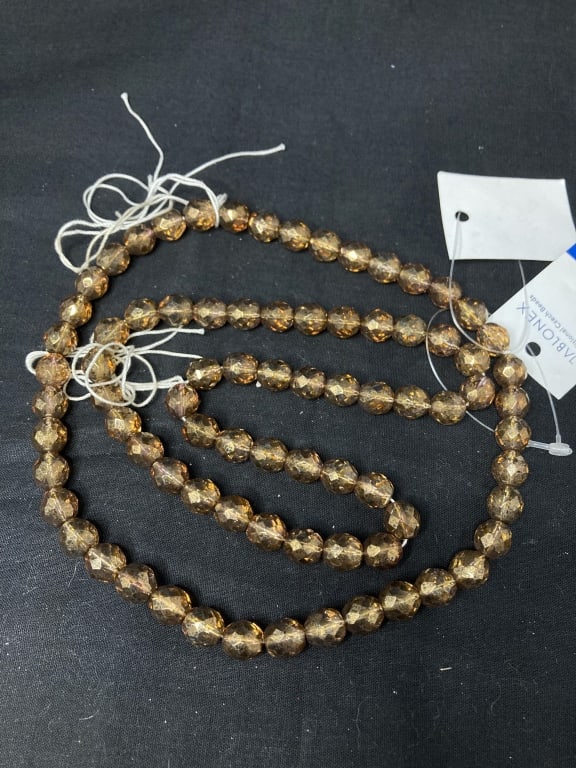 Group of Gold Tone Faceted Beads: Group of Gold Tone Faceted Beads