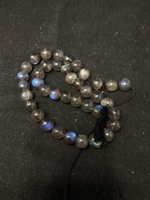 Group of Iridescent Smokey Glass Beads