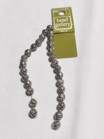 Group of Metal Beads