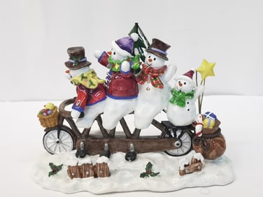Snowmen Riding Bicycle Table Decor