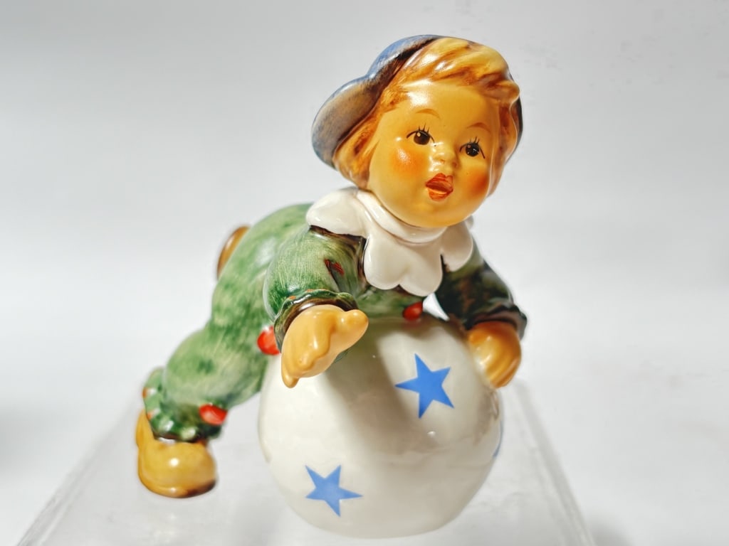 1999 Goebel Hummel Exclusive Ed. "Rolling Around": 1999 Goebel Hummel Exclusive Ed. "Rolling Around" Figurine, 3.5in by 3in