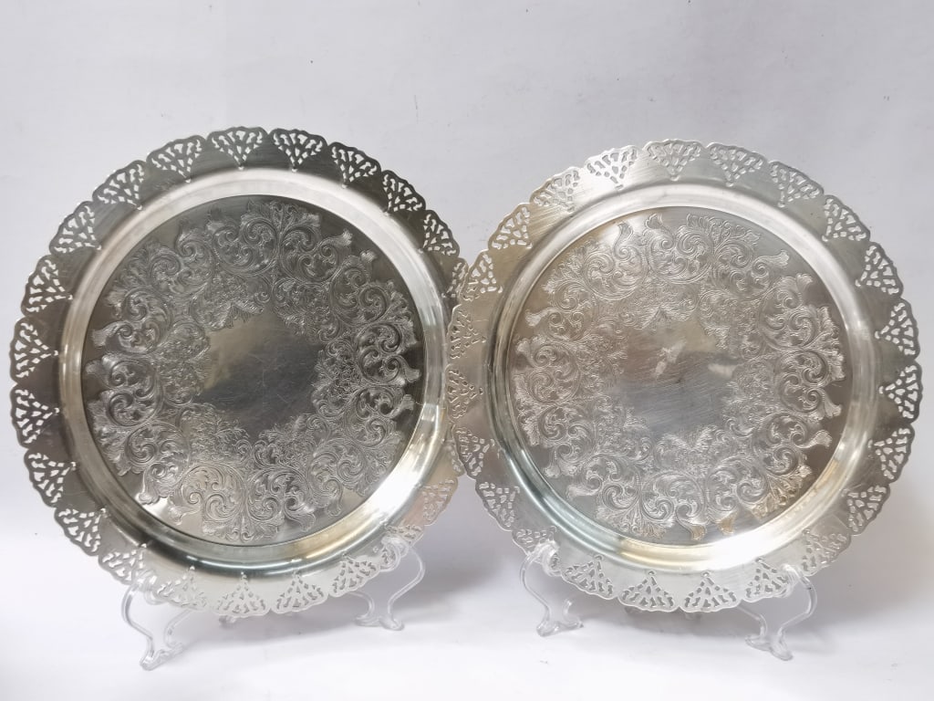 Pair of Vintage Silver Plate Pierced Chargers: Pair of Vintage Silver Plate Pierced Chargers, 12.75in