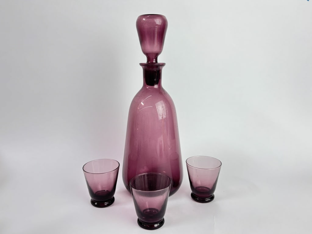 Mid-Century Amethyst Glass Decanter Set: Mid-Century Amethyst Glass Decanter Set, 10.25in by 4in