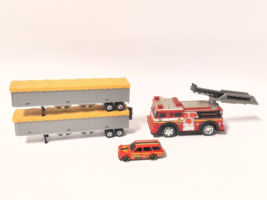 Group of Die-Cast Vehicles & Semi Trailers: Group of Die-Cast Vehicles & Semi Trailers, 7.5in by 3.75in by 2.5in