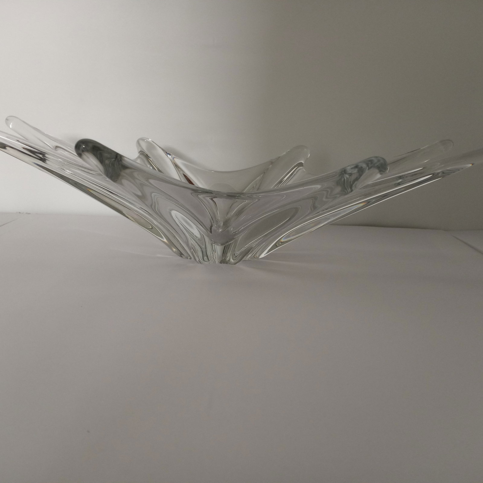 Baccarat Mid Century Stella Bowl: Large Baccarat Crystal MCM "Stella" free form Centerpiece Bowl measuring 18-1/2" x 9" x 5". The Baccarat acid etched hallmark is on the bottom.
