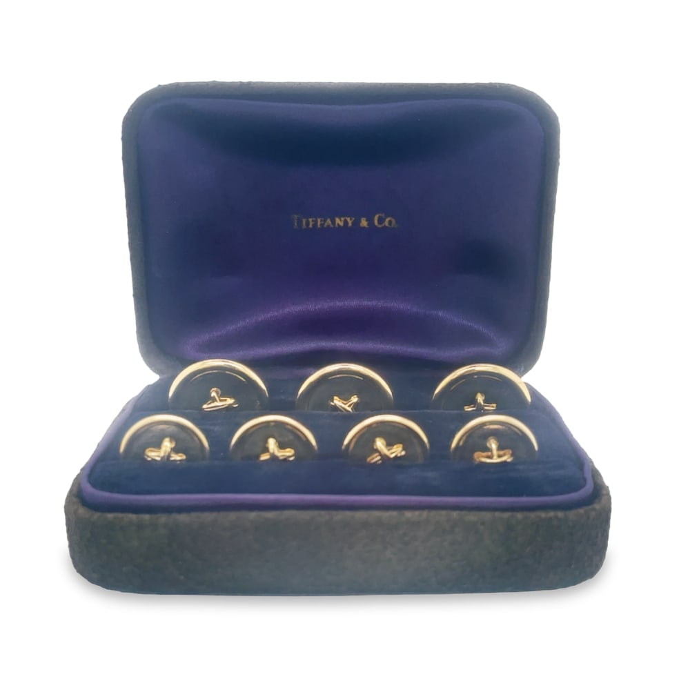 Tiffany & Co. 14k Yellow Gold Button Set: Designer: Tiffany & Co. Metal type: 14k yellow gold Set of 7 buttons Gold "threads" across center of buttons Three large (approx. 19mm wide); four small (approx. 15mm wide) Comes with Tiffany & Co. si