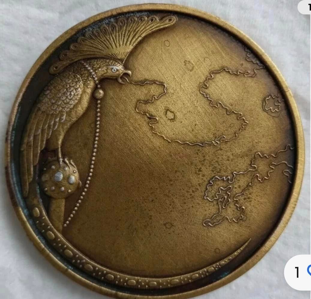 The Parrot: Erte Medallion( the parrot)