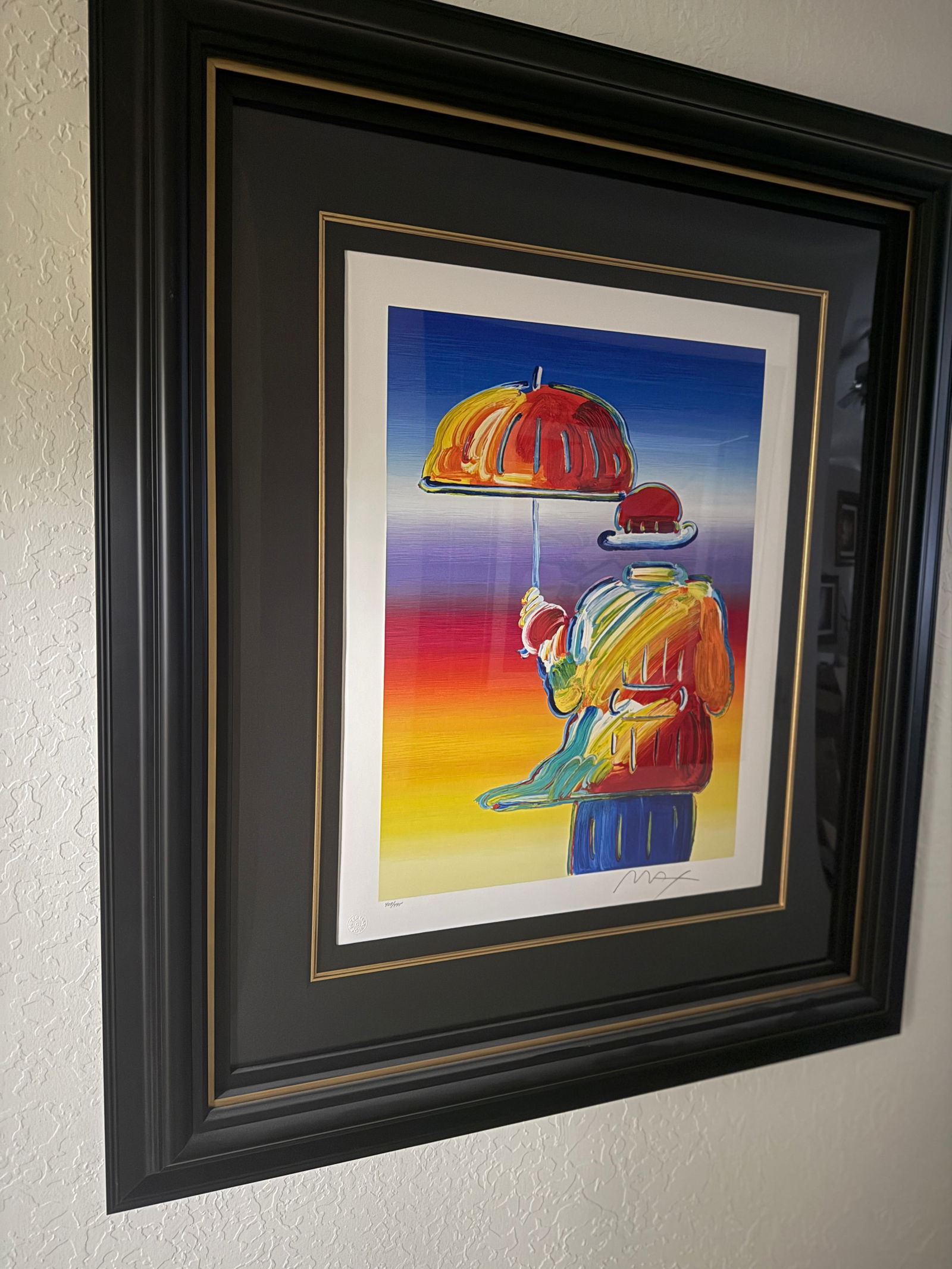 Peter Max Umbrella Man: Peter Max "Umbrella Man" 2016 21 3/4" x 16 1/8" image size Serigraph in color on wove paper. Hand-signed by the artist in pencil lower right nad numbered in Arabic, lower left. Gallery framed, COA, Ap