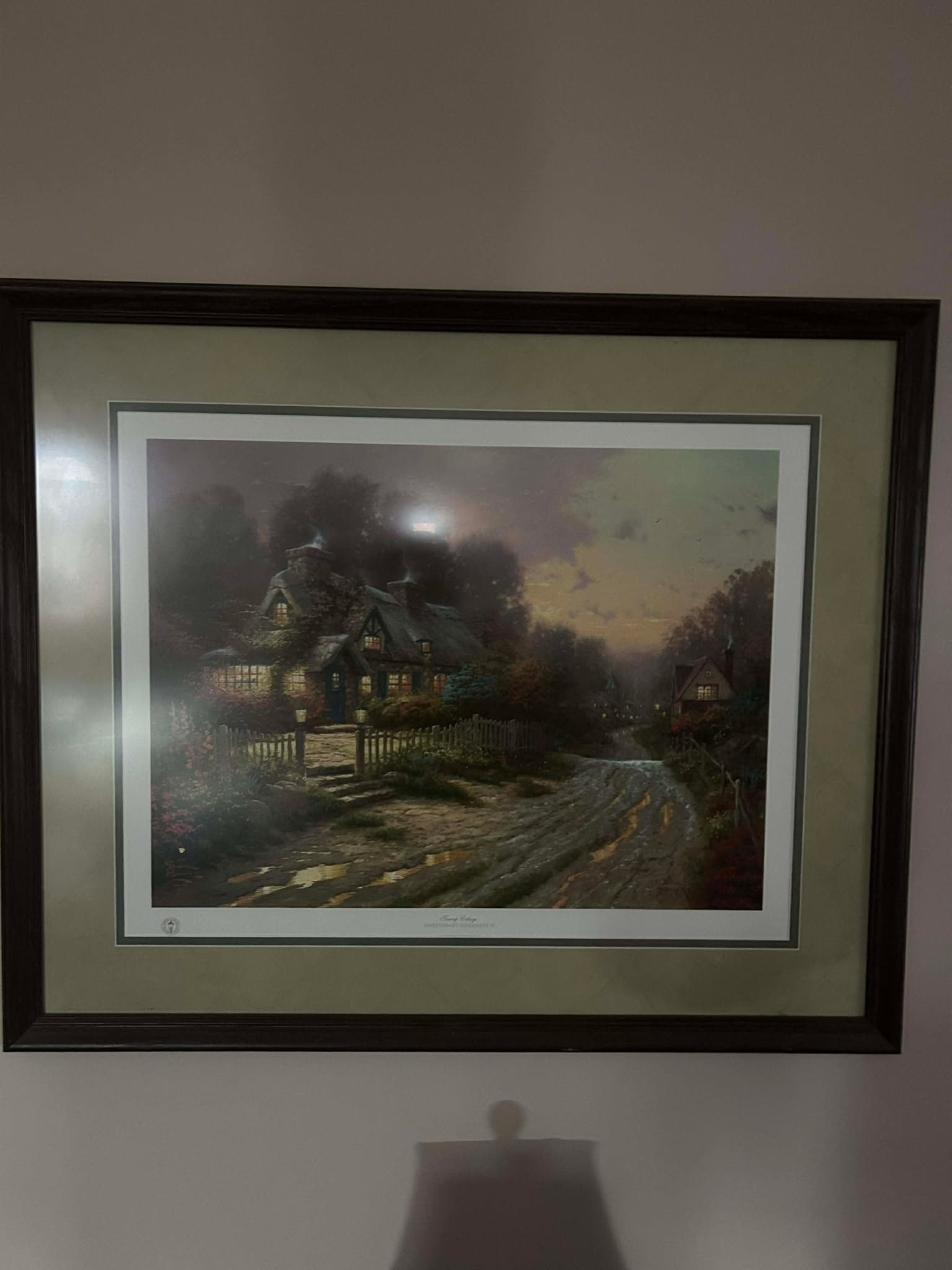 Thomas Kinkade Teacup Cottage: Thomas Kincade "Teacup Cottage" 18" x 24" offset lithograph in color on premium paper. Signed with the artists DNA matrix signature authentication system and numbered. Gallery Framed. COA. Appraisal.