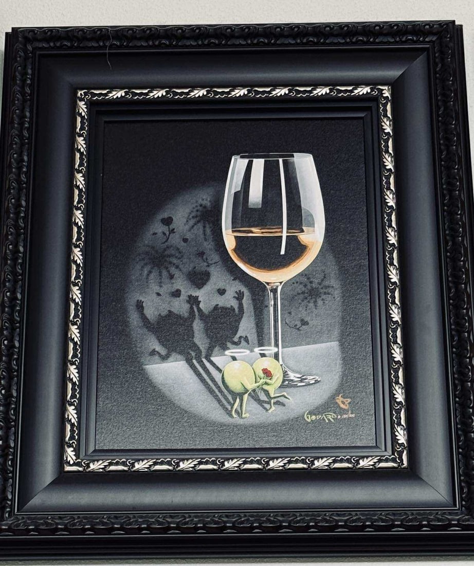 Michael Godard She Devil White Wine: Michael Godard "She Devil White Wine" 2020 23 1/2" x 17 1/2" image size Giclee in color with hand-embellishment on canvas. Hand-signed in ink lower right by the artist. Gallery framed, COA, Appraisal,