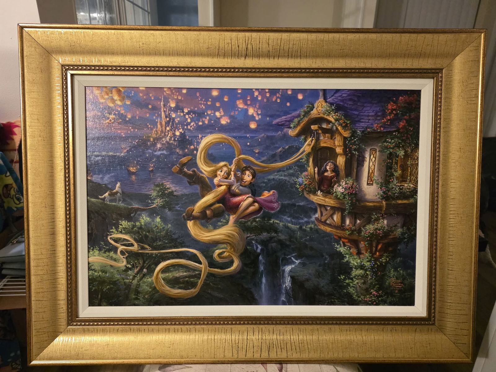 Thomas Kinkade Studios Tangled Up in Love: Thomas Kinkade Studios "Tangled up In Love" 2018 18" x 27" image size Giclee in color with actylic embellishments on canvas. Signed with the artist studios authorized signature applied through the art