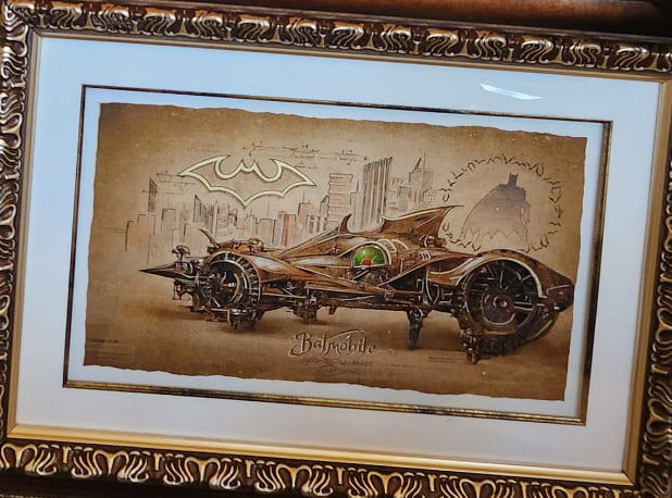 Michael Godard Batmobile: Michael Godard "Batmobile" UNIQUE 2023 25 1/4" x 34" Mixed media on paper. Hand-signed in pigment lower center by the artist. Gallery Framed COA