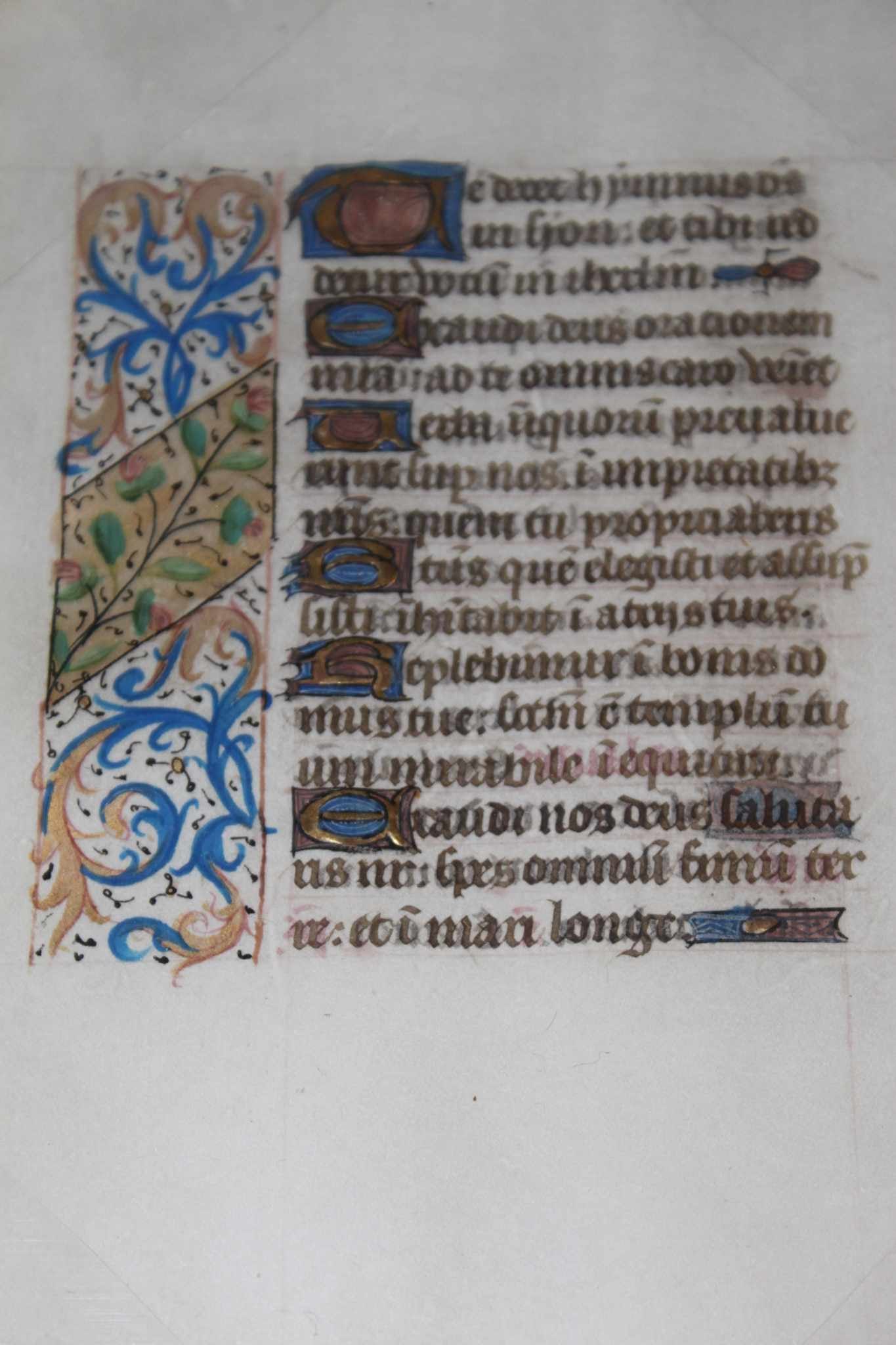 Leaf from a Book of Hours: Manuscript, Leaf from a Book of Hours. C 1475 6 3/8" x 4 3/8" Image size A leaf on vellum from a Book of Hours containint decorated initials with text in a gothic bookhand. Rubrics in red and text in