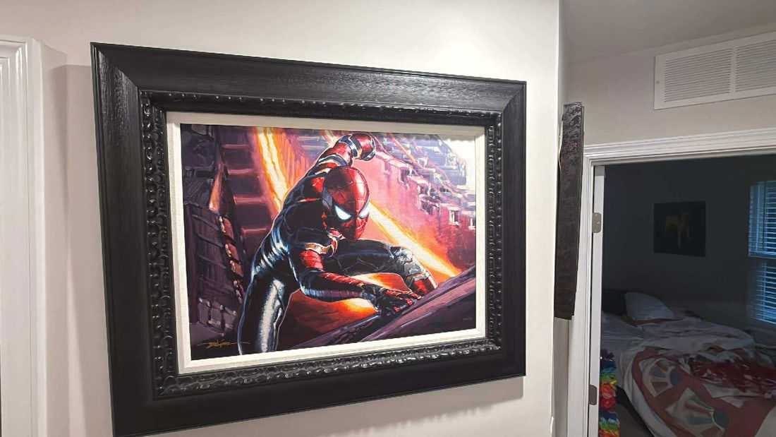 Rodel Gonzalez Friendly Neighborhood Spiderman: Rodel Gonzalez "Friendly Neighborhood Spiderman" 2022 18" x 24" image size giclee in color on canvas. Hand-signed in pigment lower left by the artist. Gallery framed, COA, Appraisal JR