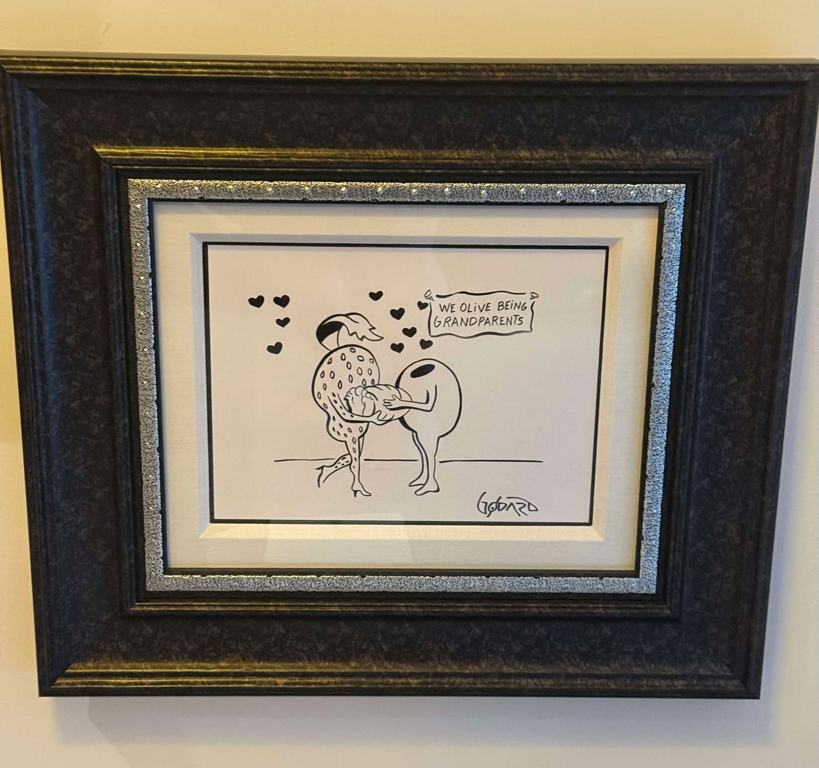 Michael Godard We Olive Being Grandparents: Michael Godard "We Olive Being Grandparents" 2019 9" x 12" image size Acrylic painting on apper. Hand-signed in pigment lower right by the artist. A unique Gallery framed, COA, Appraisal. CSR