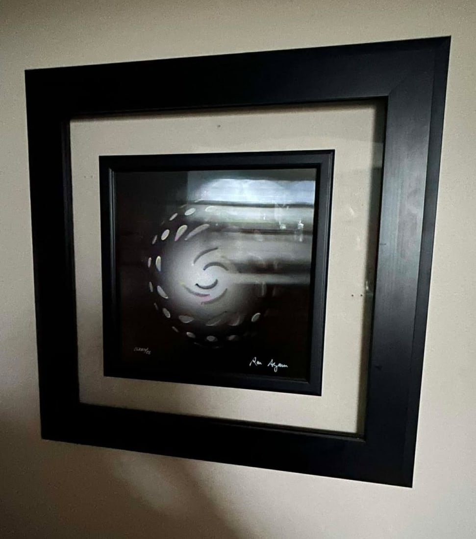 Ron Agam Galatic Black Star: Ron Agam "Galactic Black Star" 14" x 14" Holograph and lenticolor multiple in the fourth dimension. Hand signed in pigment on the lower right by the artist. Gallery Framed. COA, Appraisal. COA. GB